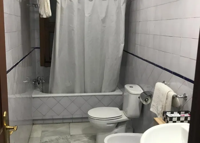 オスタル プエルタ カルモナ ゲストハウス